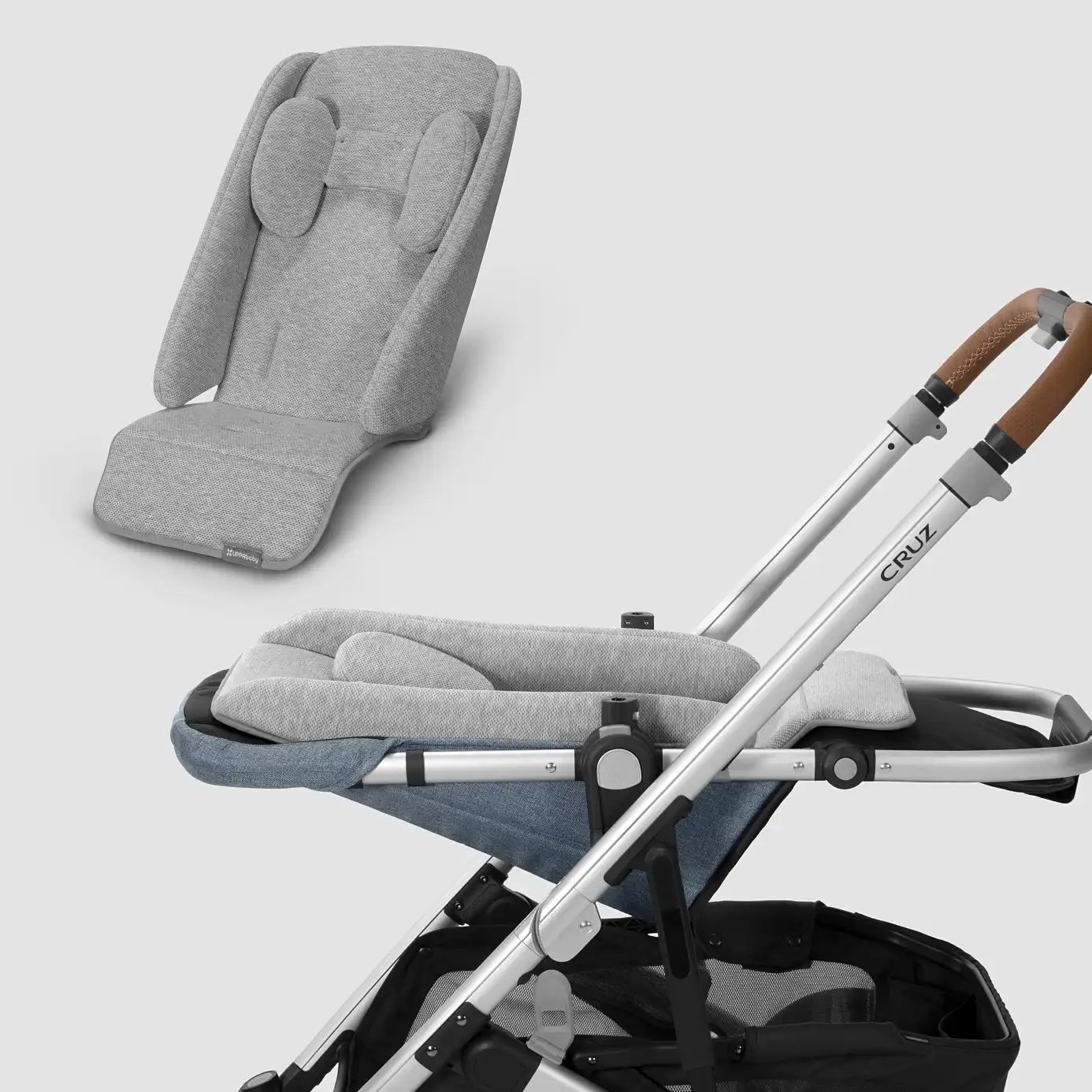 Attach Infant SnugSeat to toddler seat in Cruz stroller for added back and neck support