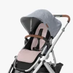 Reversible Seat Liner in Alice Fashion - Dusty Pink side attached to Vista stroller