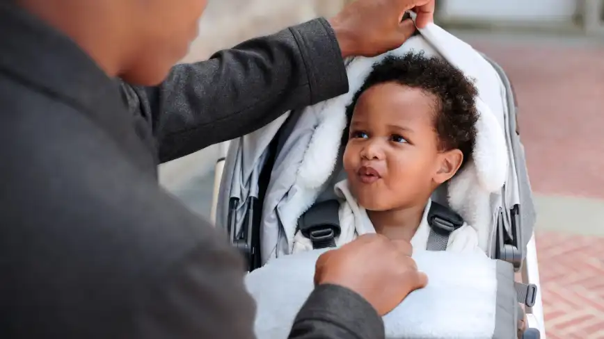 Child in Toddler Seat with CozyGanoosh