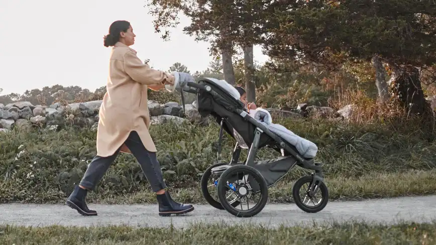 Mom pushing Ridge Stroller with CozyGanoosh