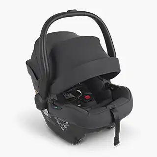 The Mesa Max infant car seat (Jake) features side ventilation for increased airflow and a carry handle with stroller release button for easy transport