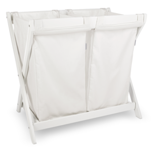 An UPPAbaby Bassinet Hamper Insert on White Bassinet Stand