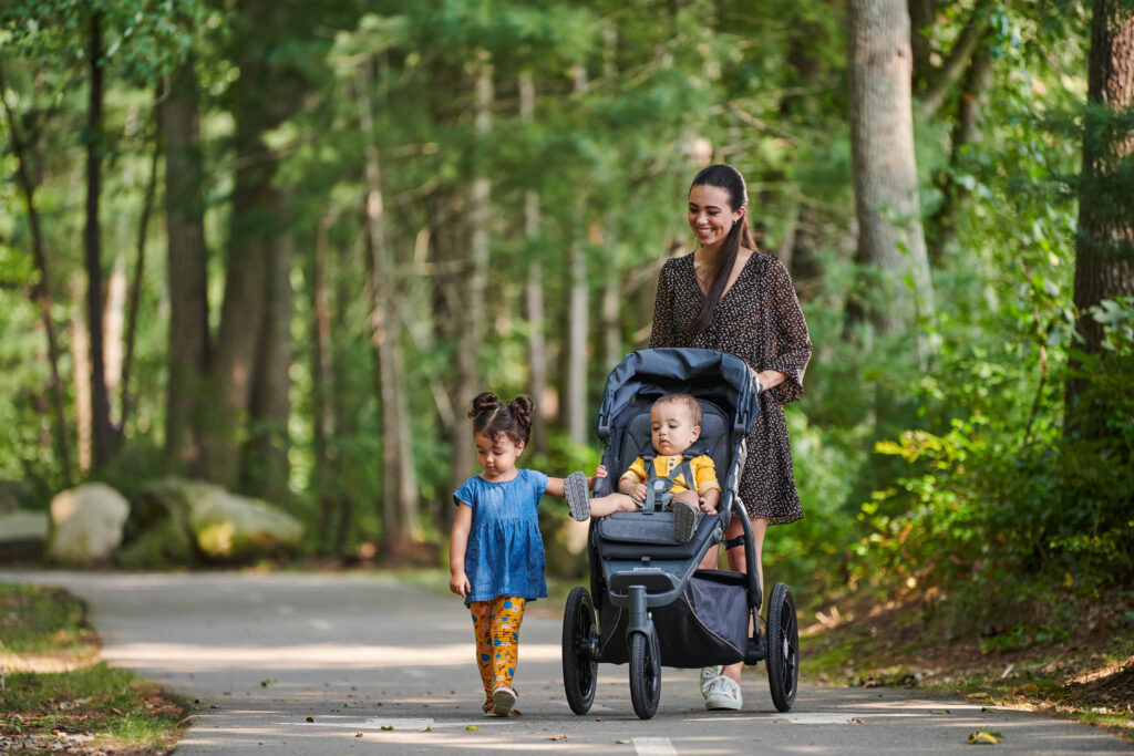 A family adventuring with their UPPAbaby Ridge Stroller