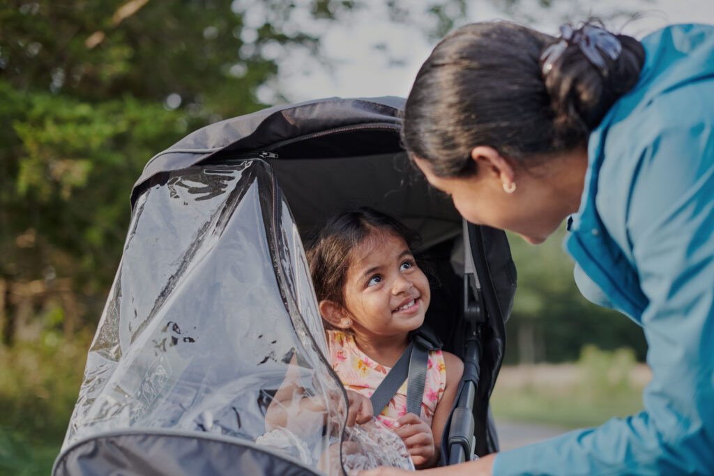 An UPPAbaby Ridge Stroller equipped with the Performance Rain Shield