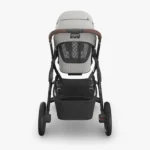 Parent view of Vista V3 (Savannah) showcasing mesh backing of All-Weather Comfort Seat, Enhanced FlexRide Suspension system, and easy-access foot brake with visual indication