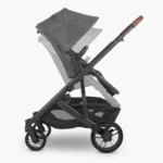 Parent facing toddler seat attached to Cruz stroller frame with use of Upper Adapters